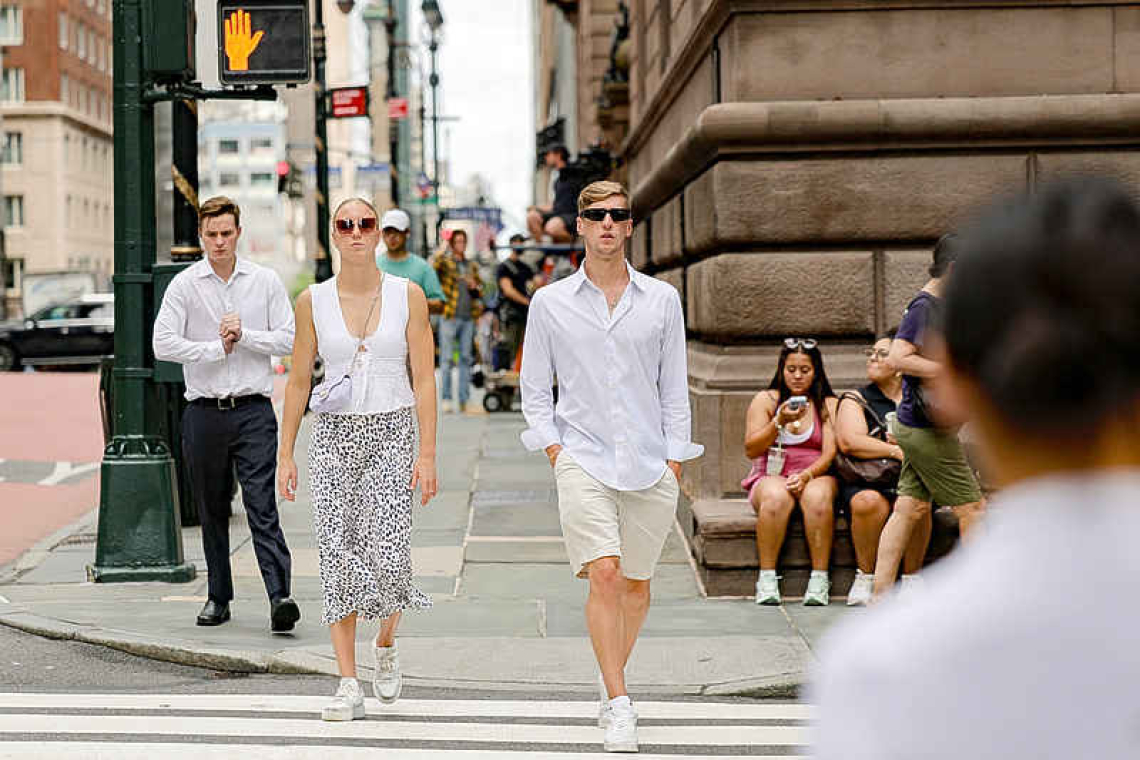 From Tokyo to London, heatwaves send men to work in shorts